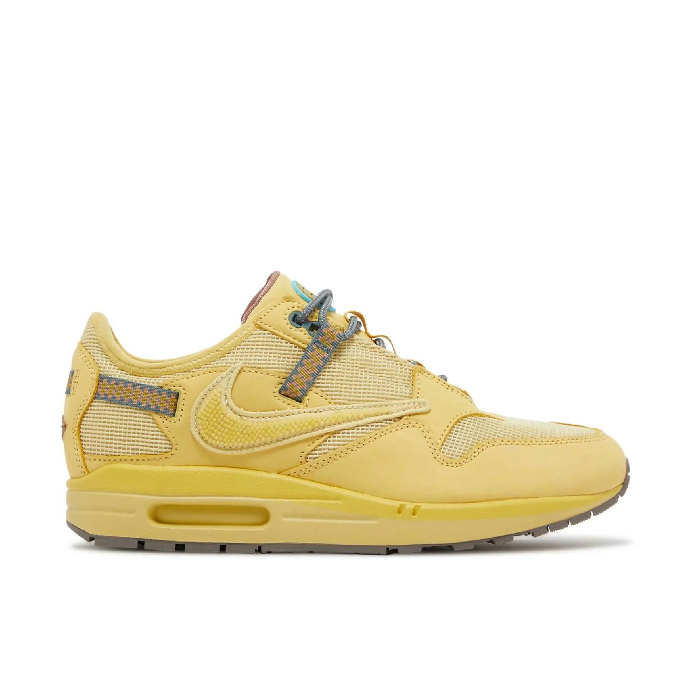 Nike Air Max sarı renkli spor ayakkabı, rahat tasarım ve şık detaylarla